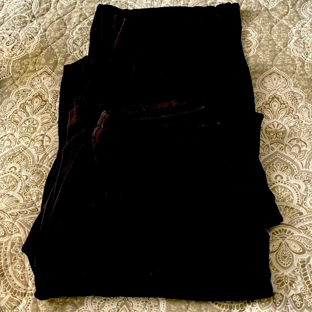 Three pairs of Chicos travelers pants size 1 in black. Like new condition